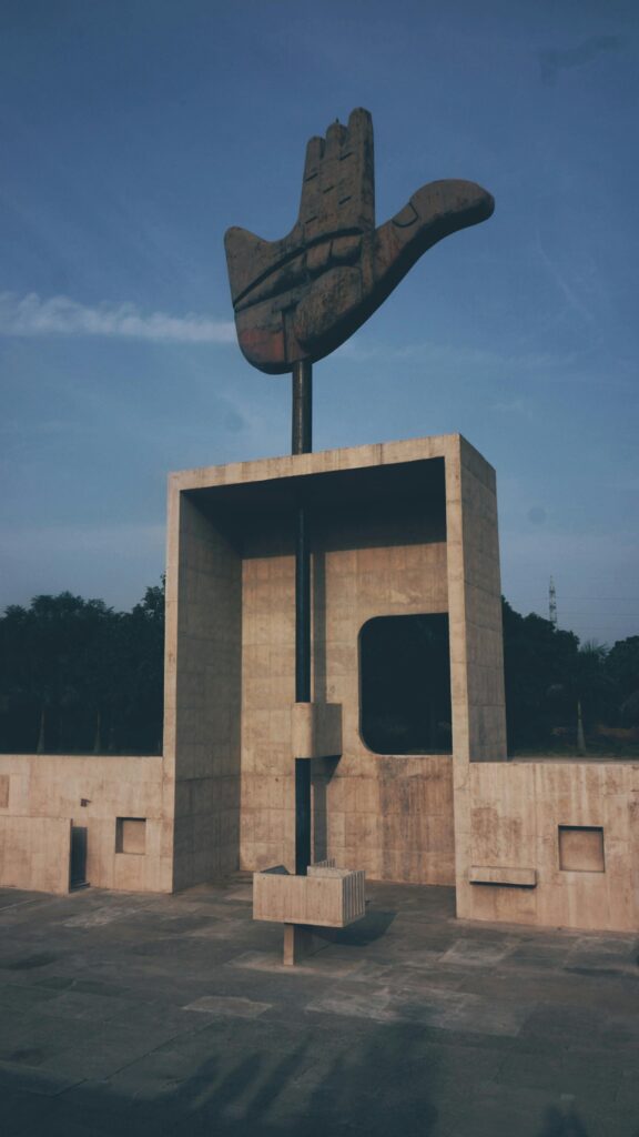 HOME The iconic Open Hand Monument in Chandigarh, India at daytime.